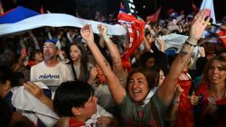 MONTEVIDEO, URUGUAY - NOVEMBER 24: Supporters of the Frente Amplio party celebrate during the Presidential election's results during the Presidential runoff on November 24, 2024 in Montevideo, Uruguay. Yamandú Orsi candidate for the Frente Amplio and Alvaro Delgado candidate for the Partido Nacional run for the presidency in a tight runoff. The winner will run the country for the 2025-2030 period. (Photo by Guillermo Legaria/Getty Images)