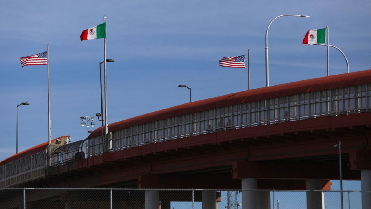 A bridge with Mexican and US flags is seen on the border of El Paso, Texas, United States, with Ciudad Juarez, Chihuahua State, Mexico, on November 28, 2024. Mexico's position is 'not to close borders', said President Claudia Sheinbaum on November 27 after US President-elect Donald Trump said in a message that she had agreed to 'stop' migration by 'effectively closing' the crossing points between the two countries. (Photo by Herika Martinez / AFP) (Photo by HERIKA MARTINEZ/AFP via Getty Images)