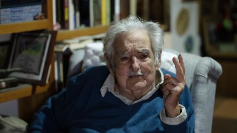Uruguay's former President (2010-2015) Jose Mujica gestures as he gives an AFP interview at his house in Montevideo on November 28, 2024. He is perhaps the most famous Uruguayan in the world, but that doesn't faze him. 'I'm not a phenomenon; I'm an ordinary guy with some eccentricities (...) a freak,' the 89-year-old former president told AFP, with a thousand battles and a brand new victory: that of his running mate Yamandú Orsi in Sunday's presidential elections, which allowed the left to return to power in this country of 3.4 million inhabitants. (Photo by Eitan ABRAMOVICH / AFP) (Photo by EITAN ABRAMOVICH/AFP via Getty Images)