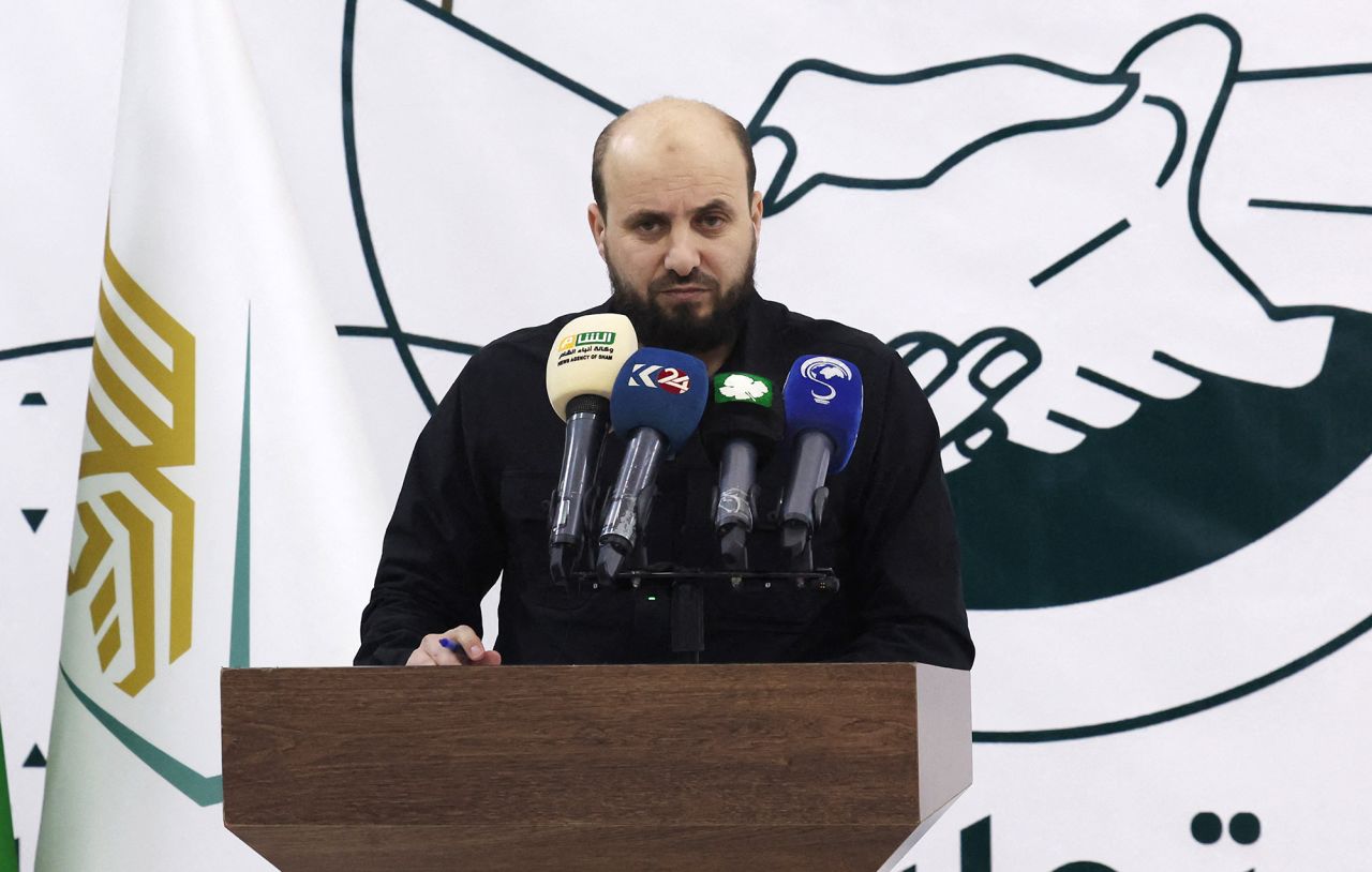 Mohamed Bashir, who is now the Syrian caretaker Prime Minister, holds a press conference in the northwestern Syrian city of Idlib on November 28.