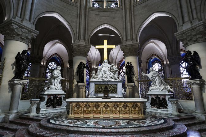 A bronze tabernacle is seen on architect Viollet-le-Duc’s altar and the statues that make up the Vow of Louis XIII.