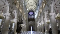 TOPSHOT - This photograph shows the nave, the western Rose window and the organ of Notre-Dame de Paris cathedral in Paris, on November 29, 2024. The Notre-Dame Cathedral is set to re-open early December 2024, with a planned weekend of ceremonies on December 7 and 8, 2024, five years after the 2019 fire which ravaged the world heritage landmark and toppled its spire. Some 250 companies and hundreds of experts were mobilised for the five-year restoration costing hundreds of millions of euros. (Photo by STEPHANE DE SAKUTIN / POOL / AFP) (Photo by STEPHANE DE SAKUTIN/POOL/AFP via Getty Images)