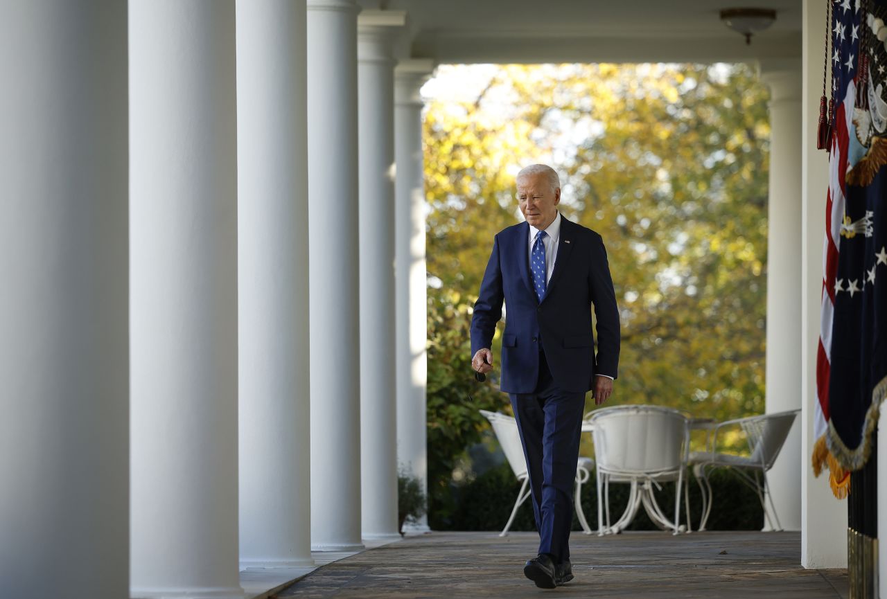 President Joe Biden walks to the Rose Garden to deliver remarks at the White House on November 26.