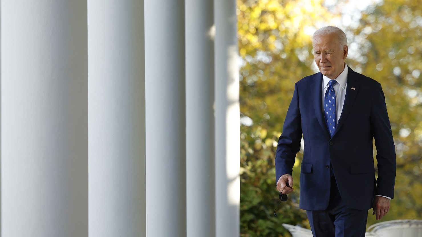 President Joe Biden walks to the Rose Garden to deliver remarks at the White House on Tuesday, November 26.