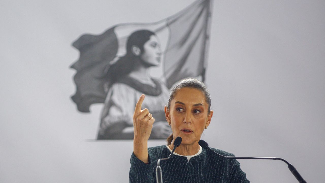 Mexico's President Claudia Sheinbaum gestures as she gives a speech during the inauguration of a family medicine unit in San Nicolas de los Garza, Nuevo Leon State, Mexico, on November 30, 2024. Mexico's position is 'not to close borders', said President Claudia Sheinbaum on November 27 after US President-elect Donald Trump said in a message that she had agreed to 'stop' migration by 'effectively closing' the crossing points between the two countries. (Photo by Julio Cesar AGUILAR / AFP) (Photo by JULIO CESAR AGUILAR/AFP via Getty Images)