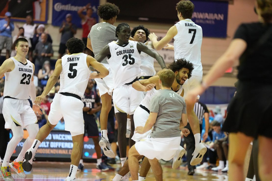 Colorado players celebrate their win at the Maui Invitational.