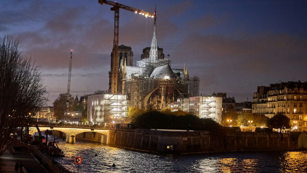 This combination of pictures created on November 29, 2024 shows (top) Firefighters douse flames billowing from the roof of Notre-Dame Cathedral in Paris on April 15, 2019 and (bottom) Notre-Dame de Paris cathedral a few days before its reopening, in central Paris on November 26, 2024. The Notre-Dame Cathedral is set to re-open early December 2024, with a planned weekend of ceremonies on December 7 and 8, 2024, five years after the 2019 fire which ravaged the world heritage landmark and toppled its spire. Some 250 companies and hundreds of experts were mobilised for the five-year restoration costing hundreds of millions of euros.