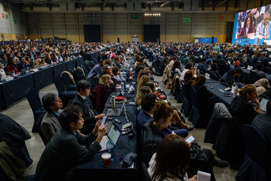 Delegates and guests attend an open plenary session of the fifth session of the UN Intergovernmental Negotiating Committee on Plastic Pollution (INC-5) in Busan on December 1.