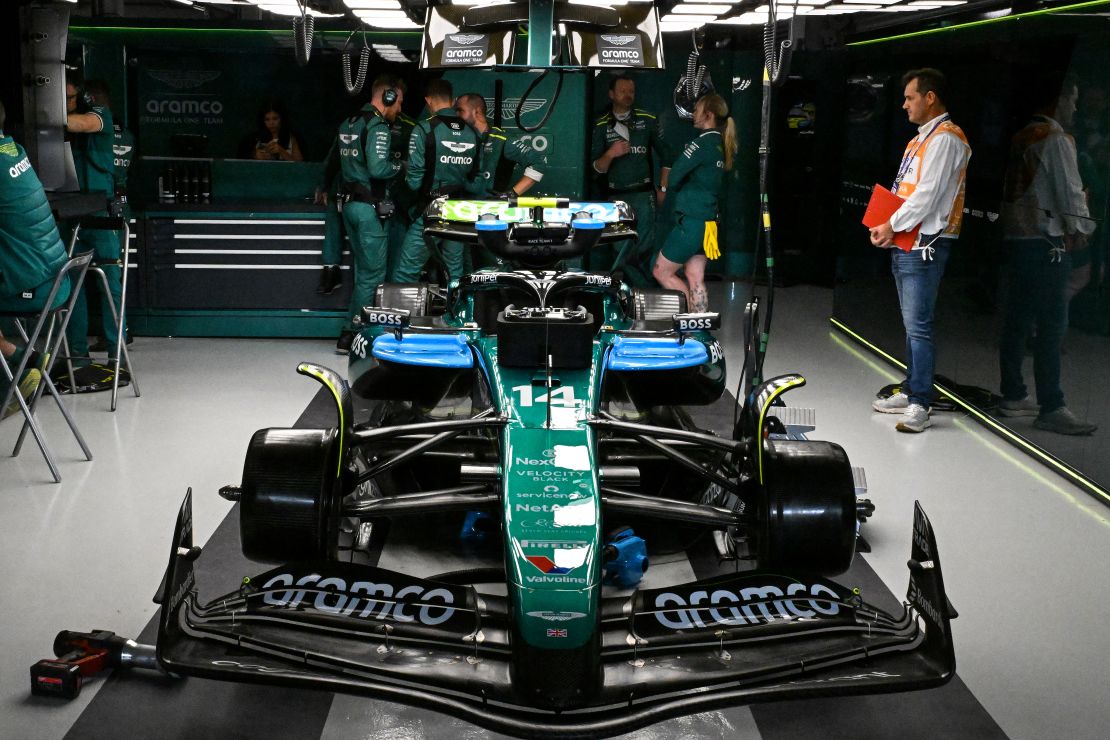 Mechanics work on Alonso's car ahead of the Qatar Grand Prix.