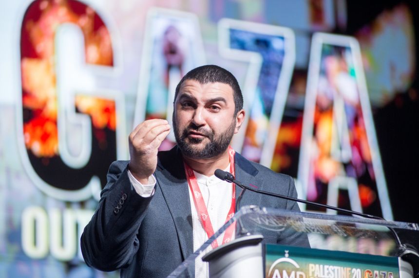 Sami Hamdi, pictured speaking in November 2024 in Illinois, was arrested on Sunday by federal immigration officers at San Francisco International Airport.