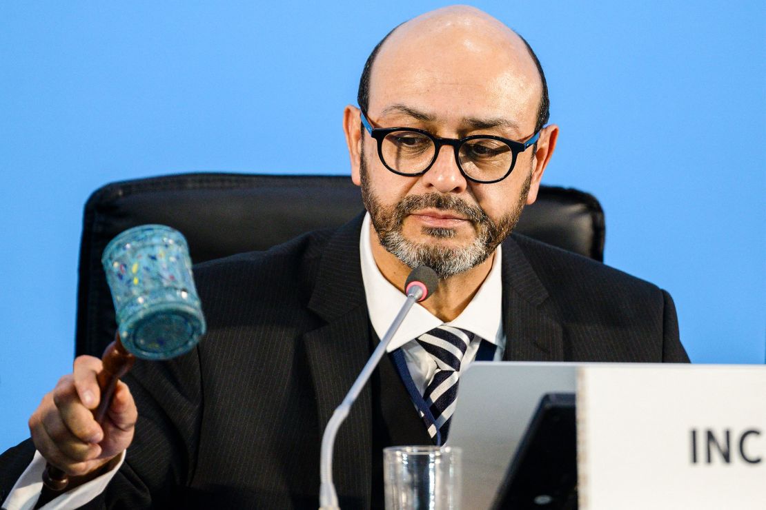 INC-5 Chair Luis Vayas Valdivieso brings down a gavel, made with recycled plastic bottle tops from the Dandora landfill in Nairobi, to mark an agreement that talks will resume at a later date early on December 2 in Busan.