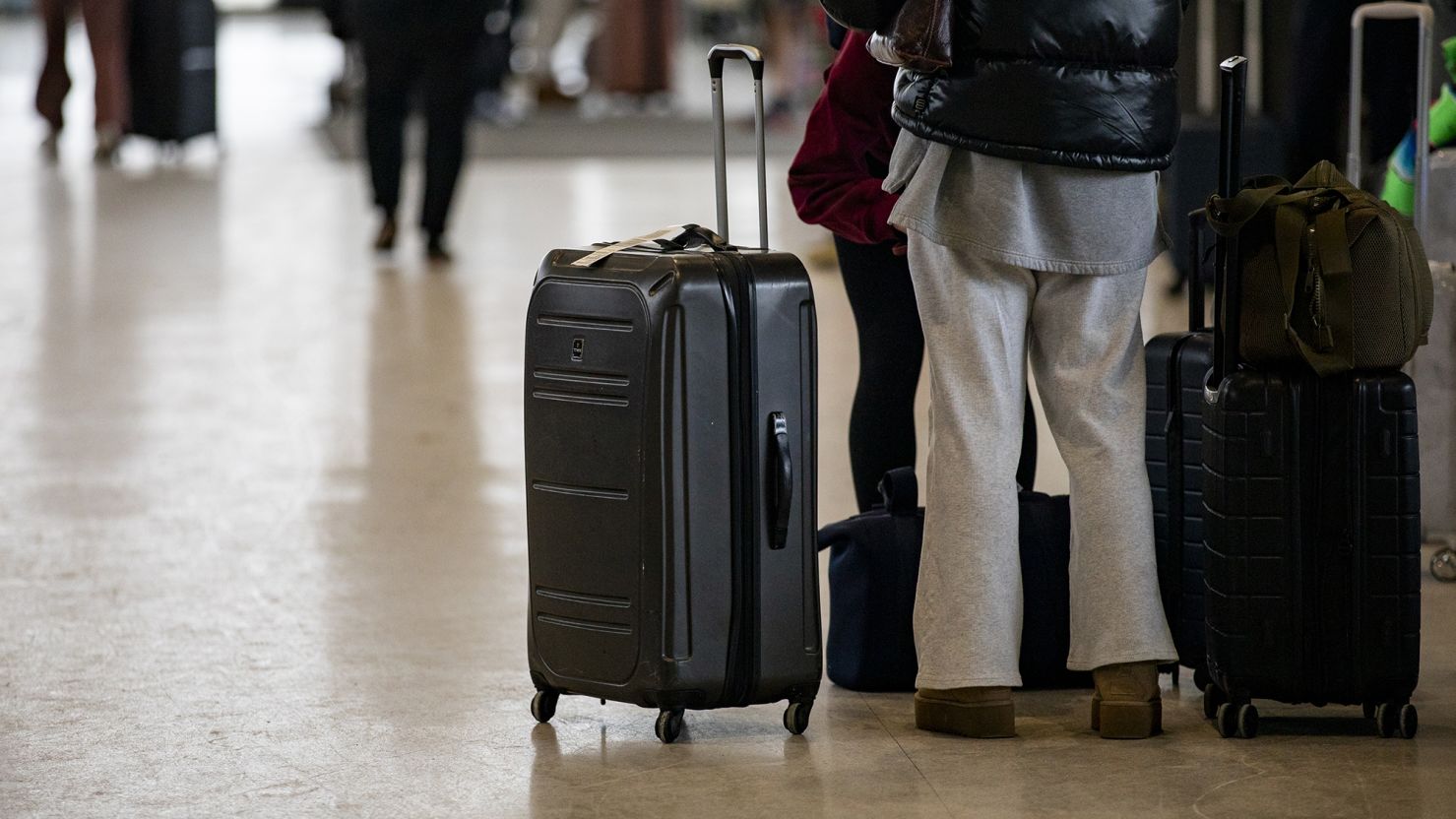 Americans are running out of time to get the best fares -- and seats -- on holiday flights. Travelers are seen here at the Detroit Metropolitan Wayne County Airport in 2024 when record numbers of Americans traveled for Thanksgiving and Christmas.