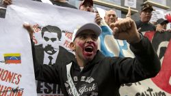 A demonstrators shouts slogans during a rally against Venezuelan President Nicolas Maduro in Bogota December 1, 2024. (Photo by Alejandro Martinez / AFP) (Photo by ALEJANDRO MARTINEZ/AFP via Getty Images)