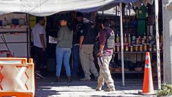 Members of Guanajuato's state Criminal Investigation Unit conduct an investigation in the commercial area of Apaseo el Grande, Guanajuato state, Mexico, where eight people were murdered last Saturday night by a group of several armed men on December 1, 2024. Gunmen shot up stores in a strip mall in Mexico, killing eight people. Two of the fatalities were firefighters and a third was a paramedic for the state health care system, officials said. Two other people were wounded. Guanajuato is a thriving industrial hub and home to several popular tourist destinations, but it is also now considered Mexico's most violent state. Officials say violence in the state stems from a conflict between the local Santa Rosa de Lima gang and the Jalisco New Generation cartel, one of the most powerful in all of Mexico. (Photo by MARIO ARMAS / AFP) (Photo by MARIO ARMAS/AFP via Getty Images)