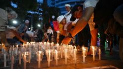 Relatives of people detained during protests following the disputed July 28 presidential elections and of other political prisoners light candles during a demonstration demanding their release in Caracas on December 1, 2024. (Photo by Juan BARRETO / AFP) (Photo by JUAN BARRETO/AFP via Getty Images)