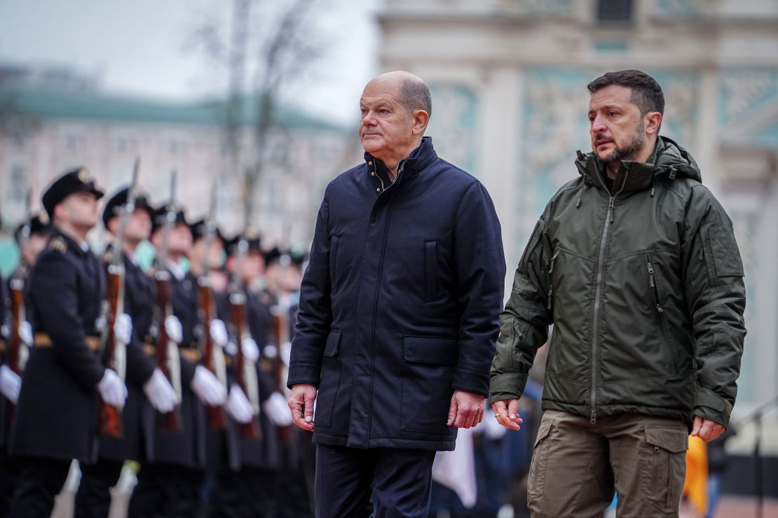 Scholz meets with Ukrainian President Volodymyr Zelensky outside St. Sophia's Cathedral in Kyiv on Monday.