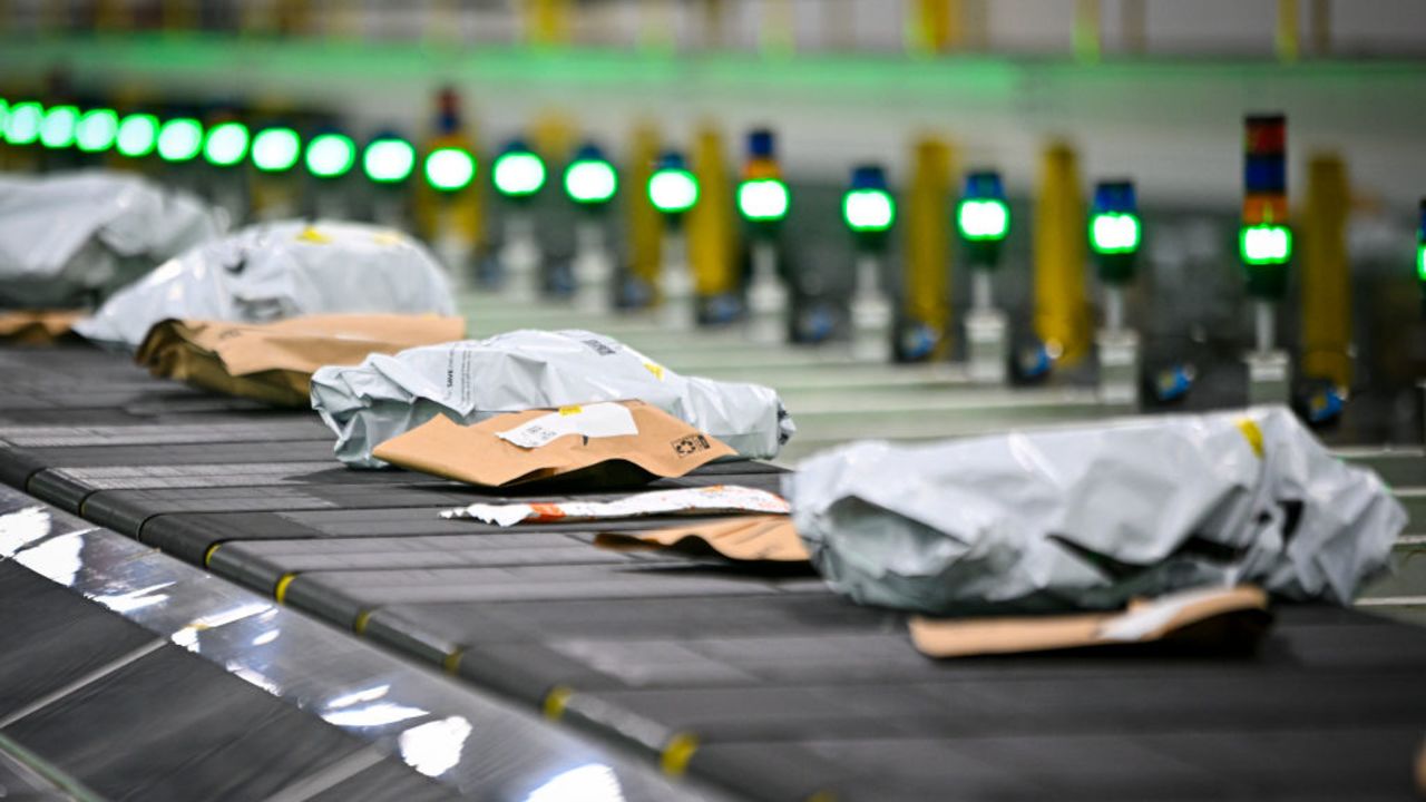 ORLANDO, FLORIDA DECEMBER 2: Packages ride on a conveyor belt during Cyber Monday, one of the company's busiest days at an Amazon fulfillment center on December 2, 2024 in Orlando, Florida. The fulfillment center, one of Amazon's largest for same-day deliveries, saw more than 200 workers sorting, packing, and shipping items throughout Central Florida. This location processes more than 20,000 packages on any given day, but during the holiday season, that number jumps to more than 80,000. (Photo by Miguel J. Rodriguez Carrillo/Getty Images)