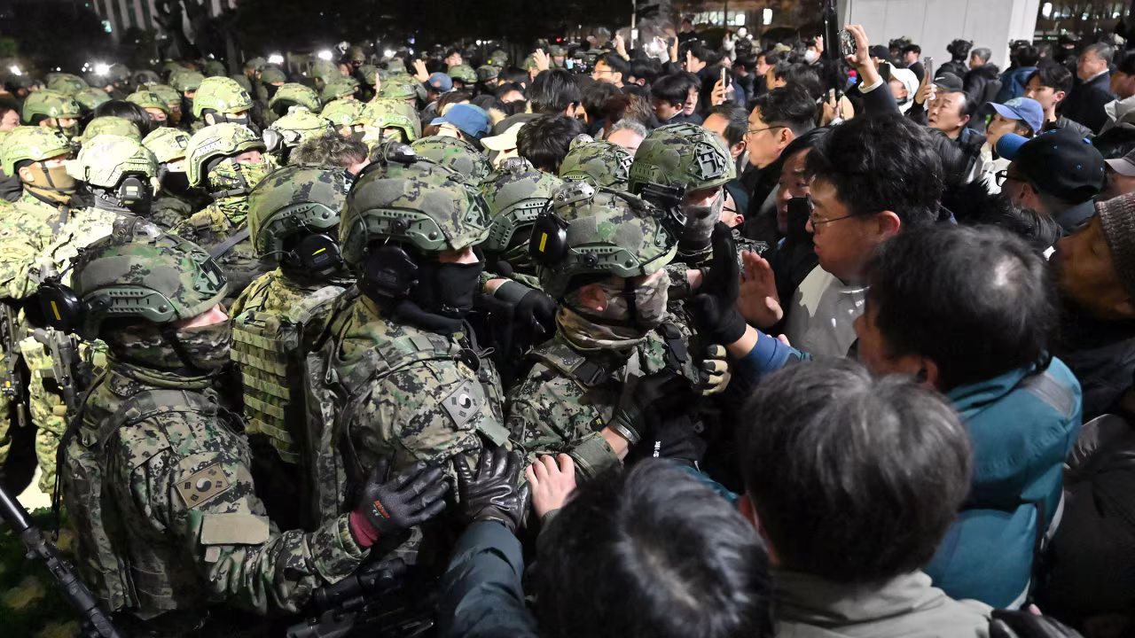 Soldiers try to enter the National Assembly building in Seoul on December 4.