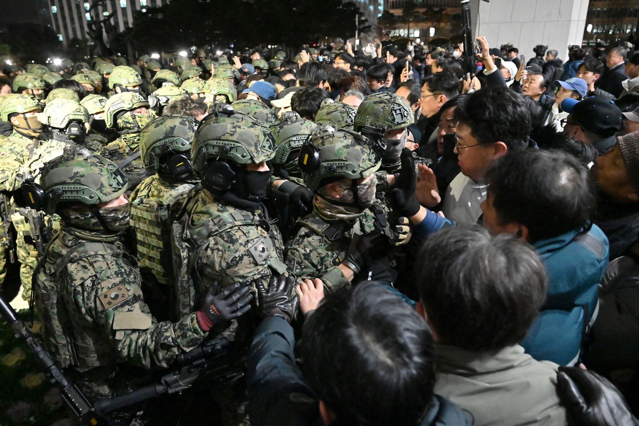 Soldiers try to enter the National Assembly building in Seoul on December 4.