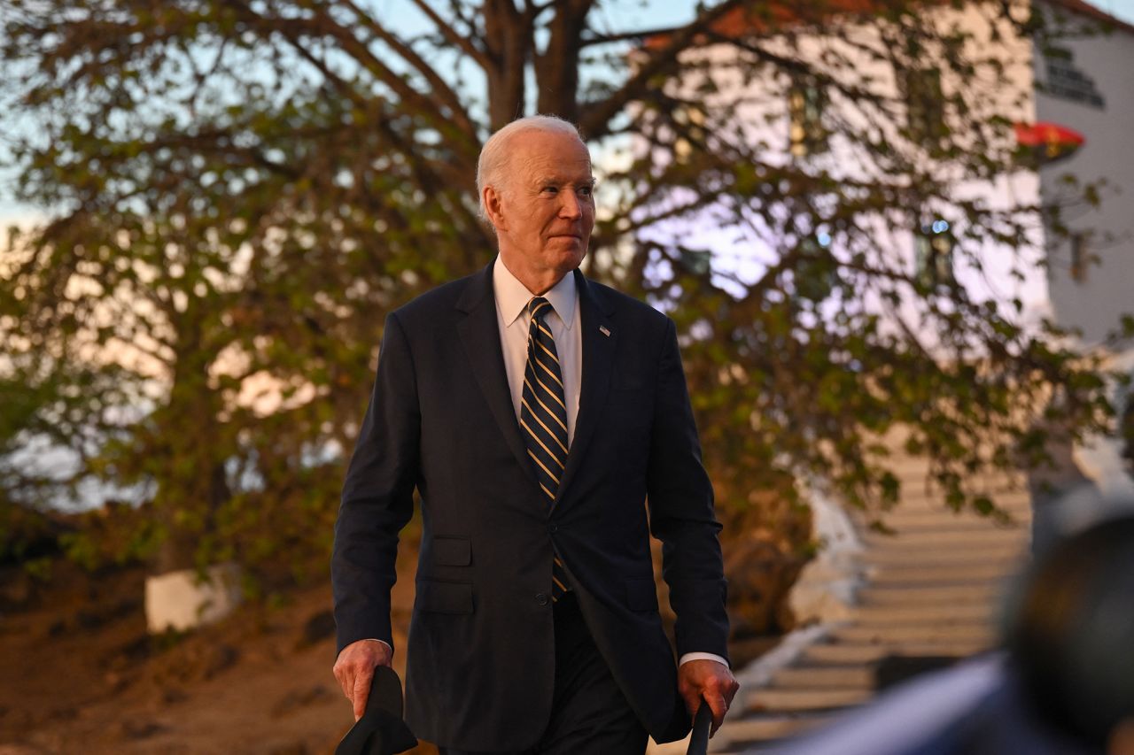 US President Joe Biden leaves after visiting the National Slavery Museum in Morro da Cruz, near Luanda, Angola, on December 3.