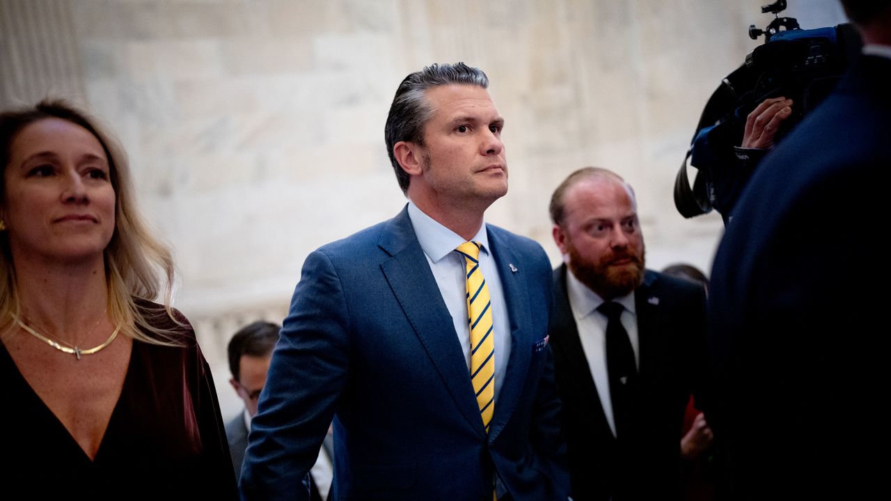 President-elect Donald Trump's nominee to be Secretary of Defense Pete Hegseth and his wife Jennifer Rauchet, left, walk through the Russell Senate Office building on Capitol Hill on December 3, 2024 in Washington, DC. Hegseth continues to meet with Senate Republicans on Capitol Hill as new allegations of alcohol abuse and sexual misconduct have emerged.