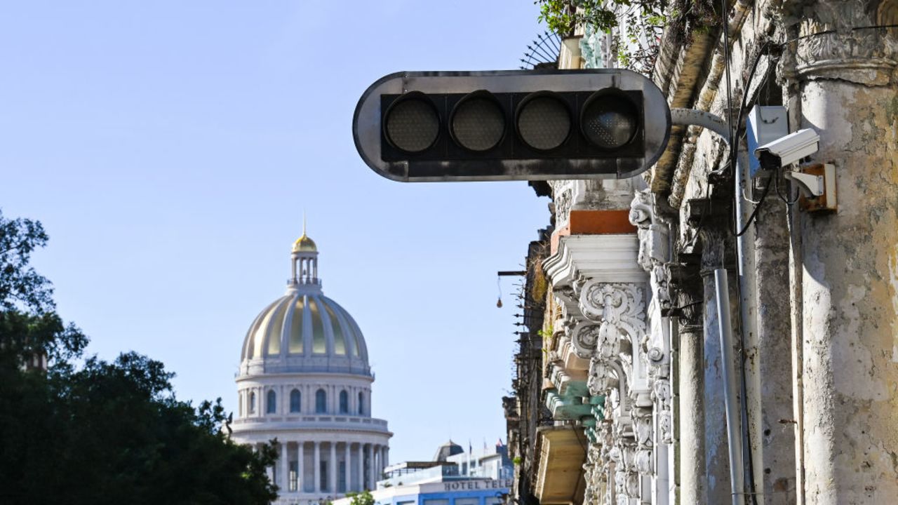 A blacked out traffic light is pictured after a power outage in Havana on December 4, 2024. Cuba's national power grid went down on December 4, due to a failure at its main thermal power plant, marking the third major blackout in the country in less than two months, the Ministry of Energy and Mines said. (Photo by YAMIL LAGE / AFP) (Photo by YAMIL LAGE/AFP via Getty Images)