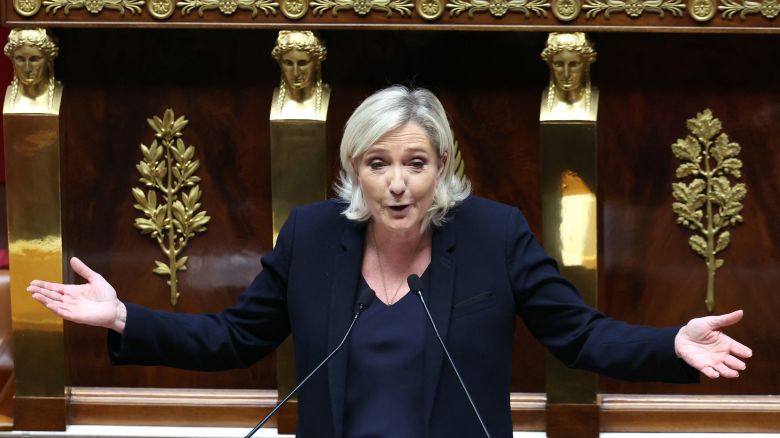 President of Rassemblement National parliamentary group Marine Le Pen speaks during the debate prior to the no-confidence votes on Prime Minister Michel Barnier's administration at the National Assembly in Paris on December 4, 2024. The French National Assembly debates two motions brought by the French left-wing Nouveau Front Populaire (New Popular Front) NFP coalition and the French far-right Rassemblement National (National Rally) RN party in a standoff over 2025's austerity budget, which saw French Prime Minister force through a social security financing bill without a vote (article 49.3) on December 2, 2024. (Photo by Alain JOCARD / AFP) (Photo by ALAIN JOCARD/AFP via Getty Images)