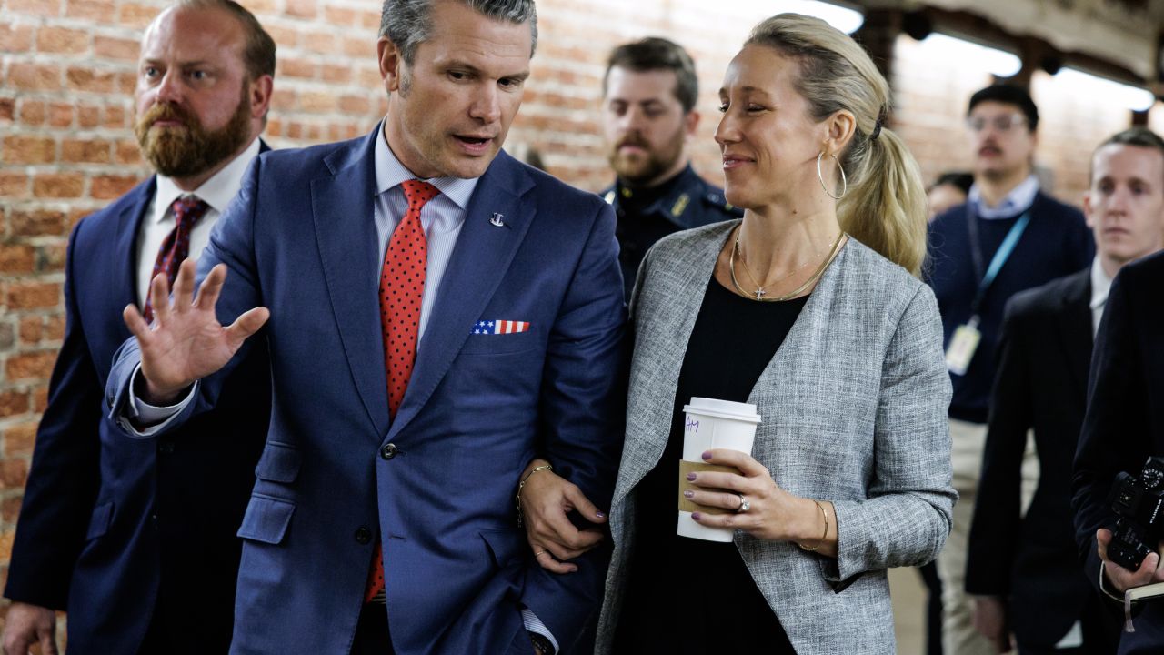 WASHINGTON, DC - DECEMBER 05: U.S. President-elect Donald Trump's nominee to be Secretary of Defense Pete Hegseth leaves a meeting with Sen. Tom Cotton (R-AR) with his wife Jennifer Rauchet as he continues to meet with lawmakers on Capitol Hill on December 5, 2024 in Washington, DC. Hegseth continues to meet with Senate Republicans on Capitol Hill as new allegations of alcohol abuse have emerged. (Photo by Samuel Corum/Getty Images)