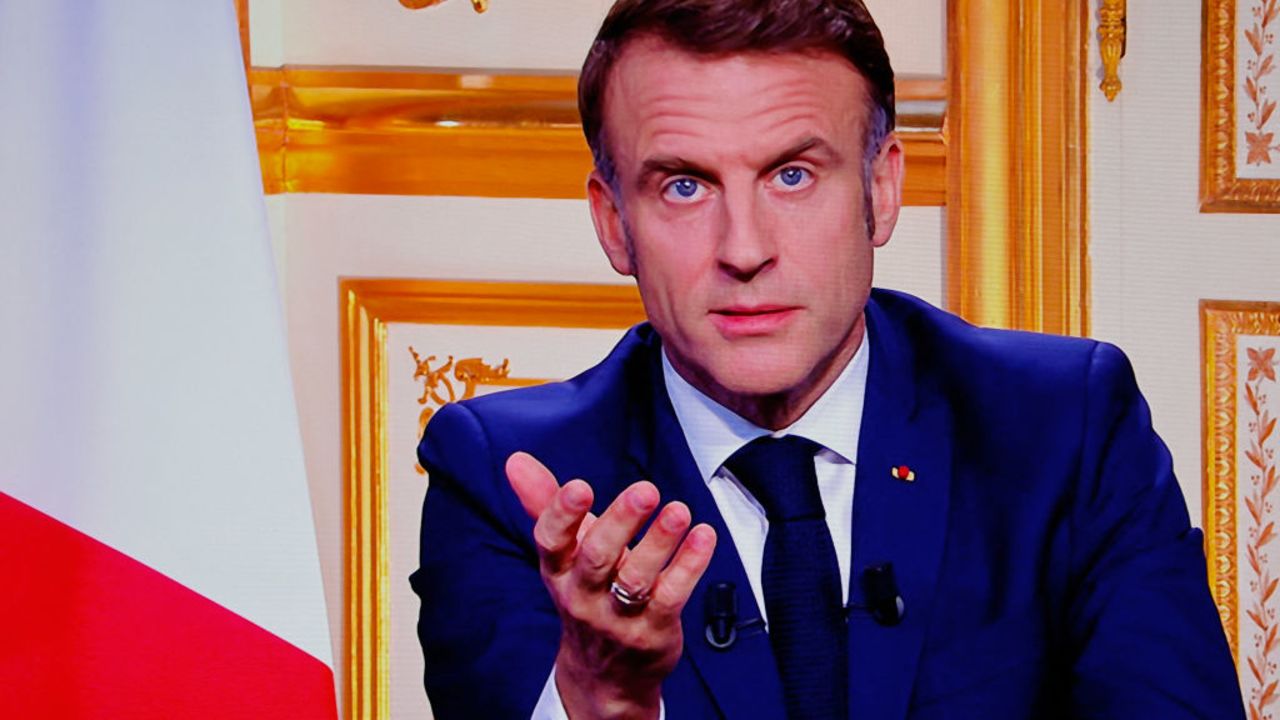 French President Emmanuel Macron is seen on monitors in a control room at AFP headquarters as he addresses the nation during a televised broadcast from the presidential Elysee Palace, on the day of the Prime Minister's resignation on December 5, 2024, following the parliamentary defeat one day prior, that forced his government to step down. President Emmanuel Macron on December 5, 2024, sought a new prime minister to prevent France from sliding deeper into political turmoil after Prime Minister's government was ousted in a historic no-confidence vote in parliament. The vote was the first successful no-confidence action since a defeat for Georges Pompidou's government in 1962, when Charles de Gaulle was president. (Photo by Ludovic MARIN / AFP) (Photo by LUDOVIC MARIN/AFP via Getty Images)