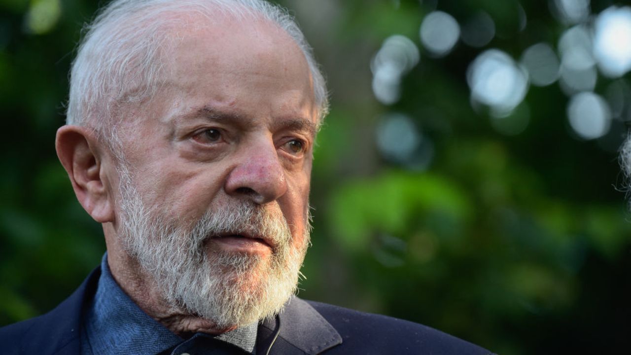 Brazil's President Luiz Inacio Lula da Silva looks on after decorating Uruguayan ex-President (2010-2015) Jose Mujica (out of frame) with the National Order of the Southern Cross during a visit to his house in Montevideo on December 5, 2024. Lula arrived in Montevideo to attend the Mercosur Summit. (Photo by Dante FERNANDEZ / AFP) (Photo by DANTE FERNANDEZ/AFP via Getty Images)