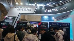 People visit a TikTok Shop booth during the China International Textile and Garment Supply Chain Expo in Hangzhou, in eastern China's Zhejiang province on December 5, 2024. (Photo by AFP) / China OUT (Photo by STR/AFP via Getty Images)