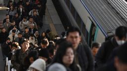Commuters disembark from a train at a train station in Seoul on December 6, 2024. (Photo by Anthony WALLACE / AFP)