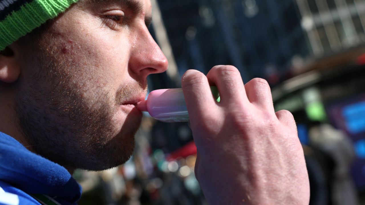 NEW YORK, NEW YORK - DECEMBER 02: A person uses a vape pen near Bryant Park on December 02, 2024 in New York City. The Supreme Court began to hear arguments on the Food and Drug Administration, refusal to approve flavored e-cigarettes over public health concerns.  (Photo by Michael M. Santiago/Getty Images)