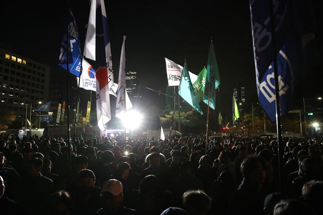 People gathered in front of the National Assembly in the early hours of December 4 in Seoul, South Korea, after President Yoon Suk Yeol declared martial law.