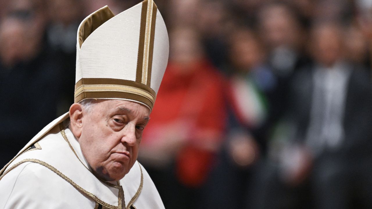 Pope Francis looks on as he attends an Ordinary Public Consistory for the creation of new cardinals, at St Peter's Basilica in the Vatican, on December 7, 2024. On December 7, Pope Francis will create 21 new cardinals from five continents, including bishops from Algiers, Tehran, Tokyo and Abidjan, many of whom may one day help choose his successor. In the tenth such consistory since he became pope in 2013, Francis, 87, is seeking again to shape the upper echelons of the Catholic Church in his image, and consolidate his legacy as the leader of a more inclusive and global institution. (Photo by Tiziana FABI / AFP) (Photo by TIZIANA FABI/AFP via Getty Images)