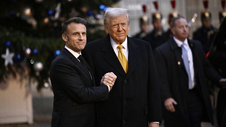 French President Emmanuel Macron welcomes US President-elect Donald Trump to the Élysée Palace in Paris on December 7.