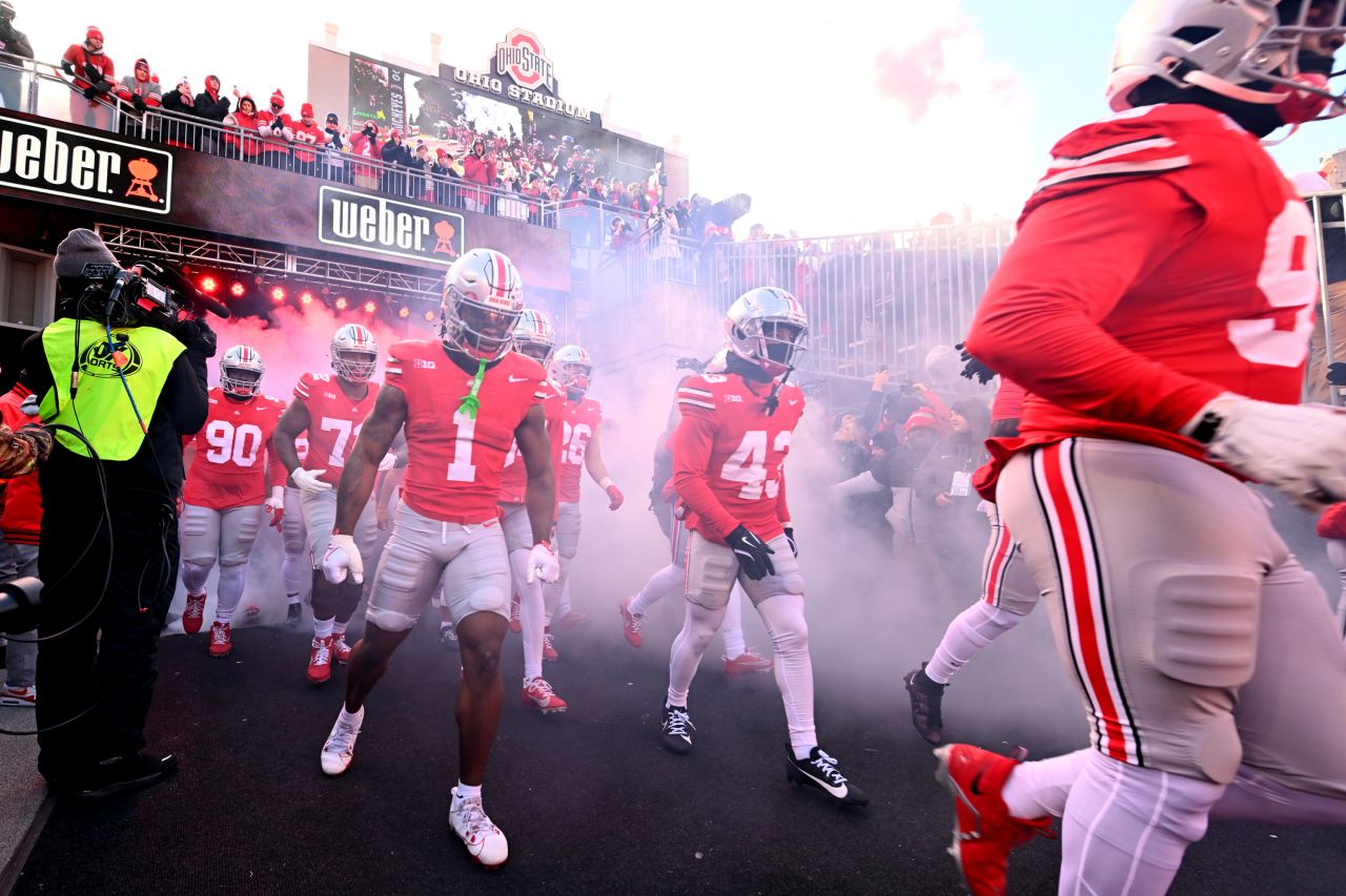 The Ohio State Buckeyes take the field prior to a game against the Michigan Wolverines in Columbus, Ohio, on November 30.