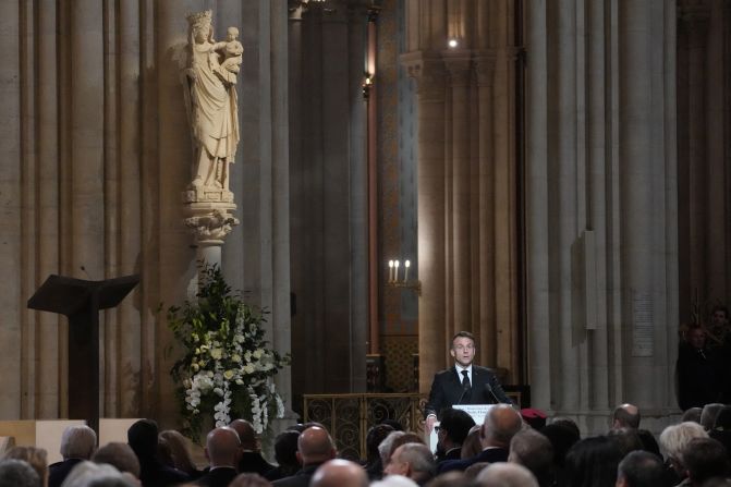 French President Emmanuel Macron delivers a speech to the 2000-strong congregation. Some 50 heads of state and government were expected in the French capital to attend the ceremony marking the rebuilding of the Gothic masterpiece five years after the 2019 fire ravaged the world heritage landmark and toppled its spire.