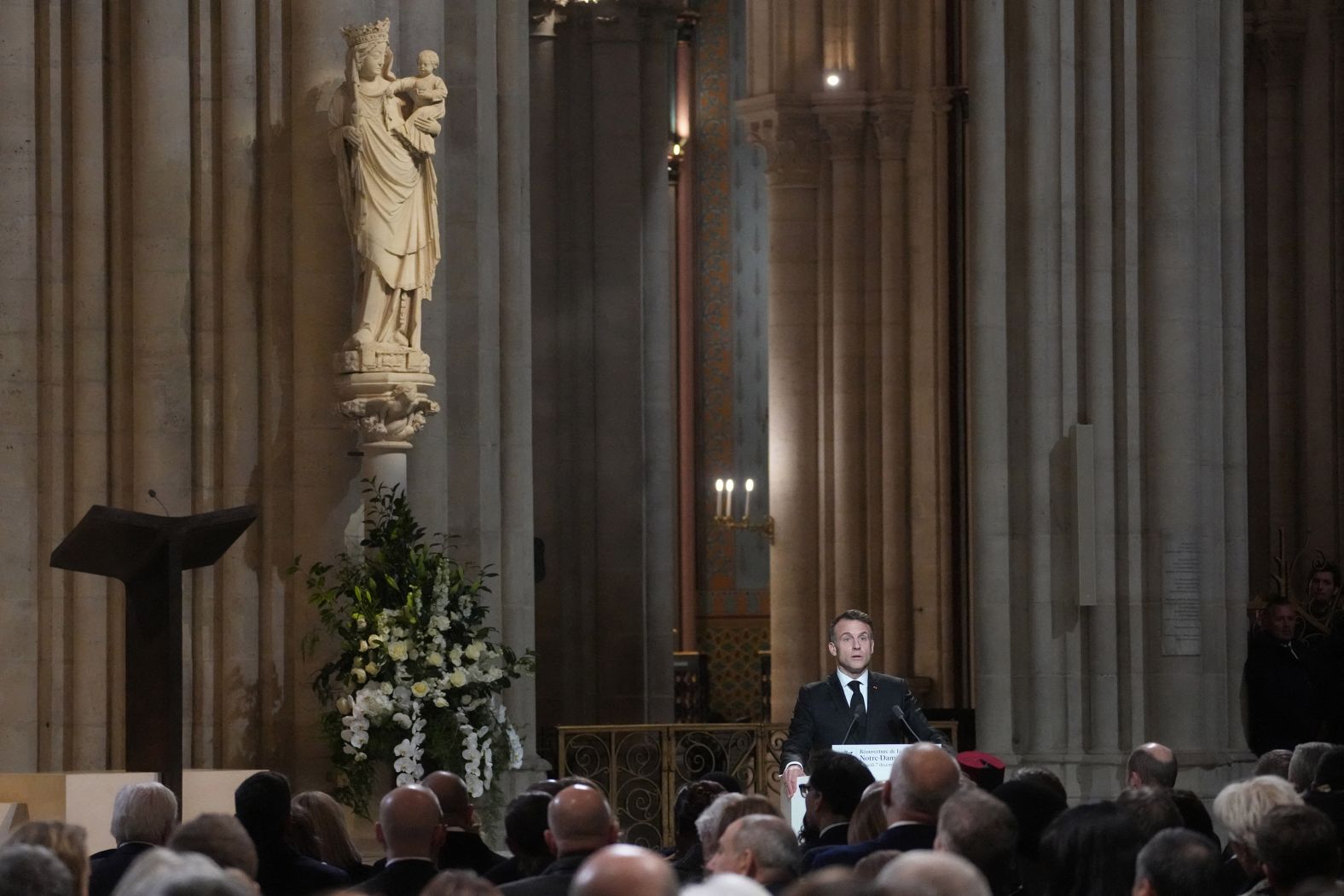 President Macron delivers a speech to the 2000-strong congregation. Some 50 heads of state and government were expected in the French capital to attend the ceremony marking the rebuilding of the Gothic masterpiece five years after the 2019 fire ravaged the world heritage landmark and toppled its spire.