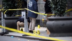 NEW YORK, NEW YORK - DECEMBER 04: Police place bullet casing markers outside of a Hilton Hotel in Midtown Manhattan where United Healthcare CEO Brian Thompson was fatally shot on December 04, 2024 in New York City. Brian Thompson was shot and killed before 7:00 AM this morning outside the Hilton Hotel, just before he was set to attend the company's annual investors' meeting. (Photo by Spencer Platt/Getty Images)