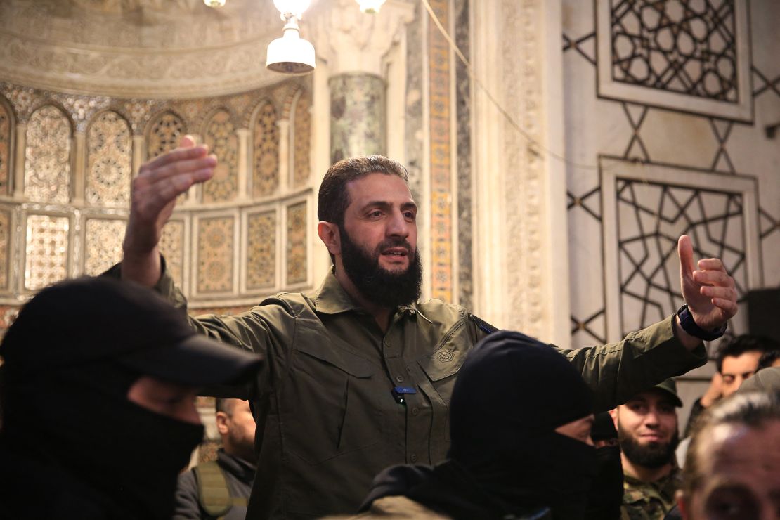 The leader of Syria's Islamist Hayat Tahrir al-Sham (HTS) group Abu Mohammed al-Jolani, speaks at the Umayyad Mosque after taking control of Damascus.