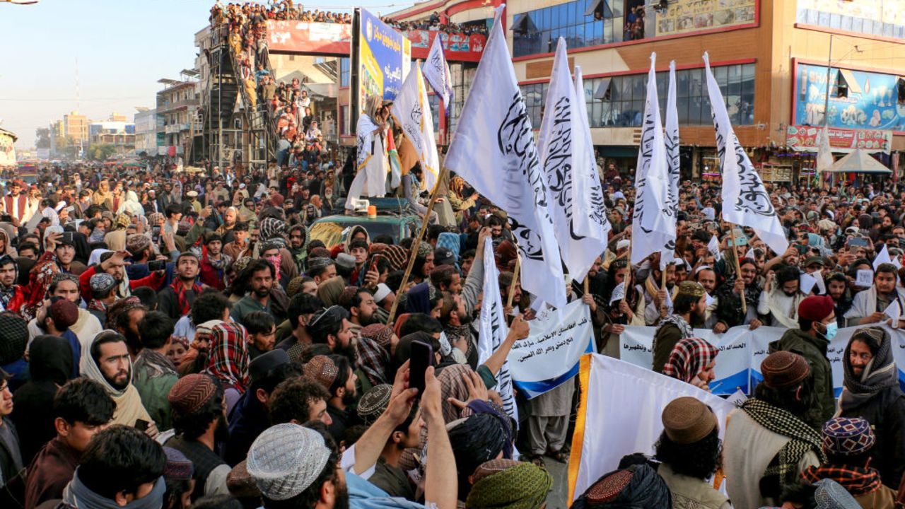 CORRECTION / Afghan nationals wave Taliban flags during celebrations in Khost province on December 8, 2024, to mark the end of Syrian dictator Bashar al-Assad's rule after rebel fighters took control of the Syrian capital Damascus overnight. Celebrations erupted around Syria and crowds ransacked President Bashar al-Assad's luxurious home on December 8, after Islamist-led rebels swept into Damascus and declared he had fled the country, in a spectacular end to five decades of Baath party rule. (Photo by AFP) / "The erroneous mention[s] appearing in the metadata of this photo by - has been modified in AFP systems in the following manner: [Khost] instead of [Nangarhar]. Please immediately remove the erroneous mention[s] from all your online services and delete it (them) from your servers. If you have been authorized by AFP to distribute it (them) to third parties, please ensure that the same actions are carried out by them. Failure to promptly comply with these instructions will entail liability on your part for any continued or post notification usage. Therefore we thank you very much for all your attention and prompt action. We are sorry for the inconvenience this notification may cause and remain at your disposal for any further information you may require." (Photo by -/AFP via Getty Images)