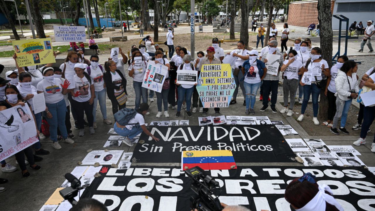 Relatives of people detained during protests following the disputed July 28 presidential elections and of other political prisoners take part in a demonstration demanding their release in front of the Public Prosecutor's Office in Caracas on December 9, 2024. (Photo by Federico PARRA / AFP) (Photo by FEDERICO PARRA/AFP via Getty Images)