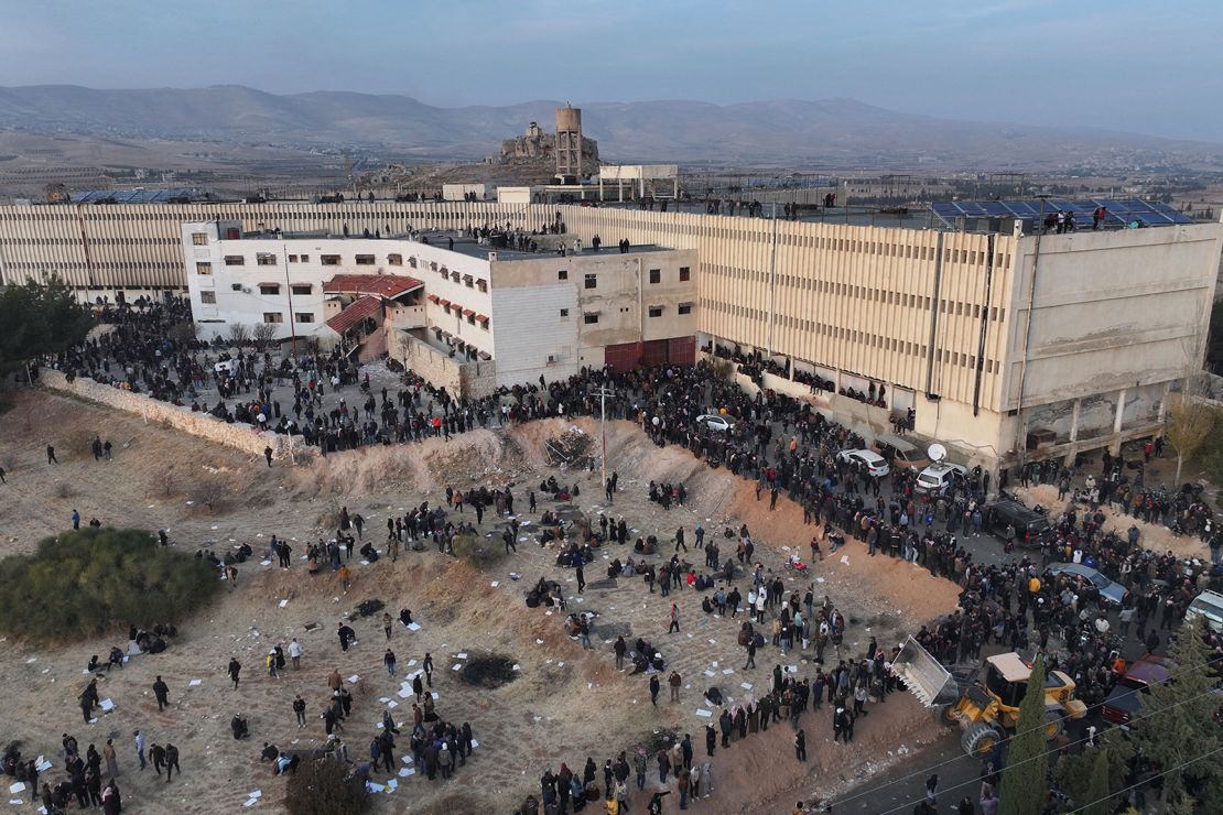 People gather at the Saydnaya prison near Damascus, Syria, on December 9, 2024.