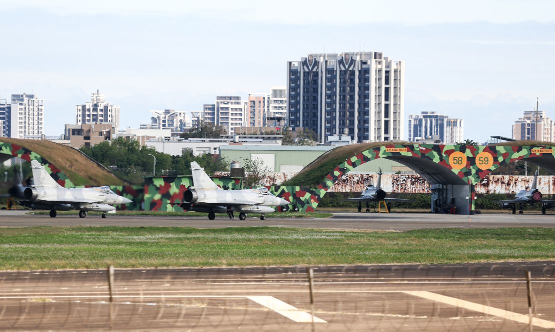 Two Taiwanese Air Force Mirage 2000 fighter jets prepare to take off at an air force base in Hsinchu on December 10, 2024.