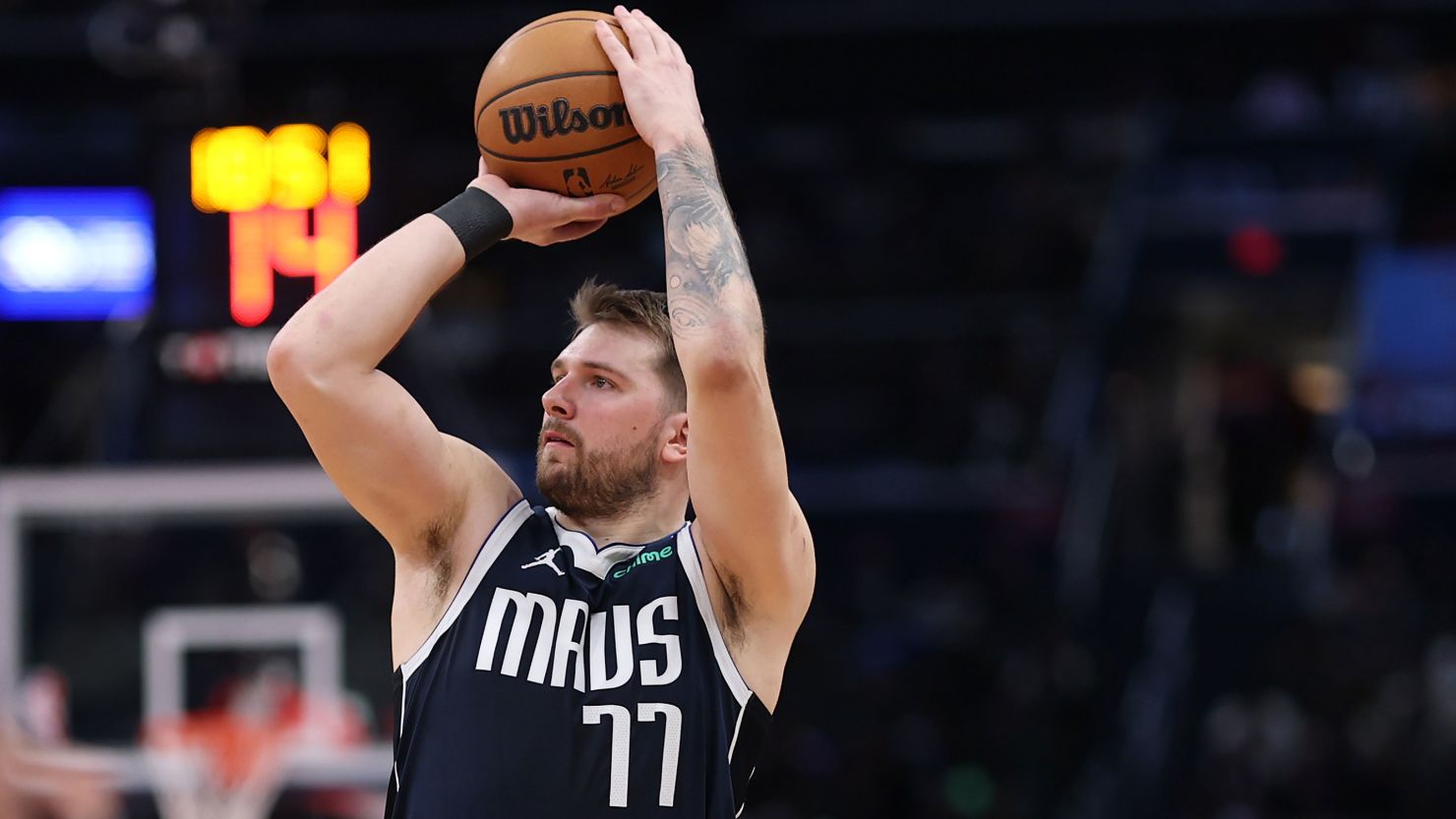 Luka Doncic #77 of the Dallas Mavericks shoots the ball against the Washington Wizards during the second half at Capital One Arena on December 5, 2024, in Washington, DC.