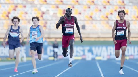 BRISBANE, AUSTRALIA - DECEMBER 07: Gout Gout of Queensland wins the final of the Boys' U18 200m in a National Record time of 20.04 seconds during the 2024 Chemist Warehouse Australian All Schools Athletics Championship at Queensland Sport and Athletics Centre on December 07, 2024 in Brisbane, Australia. (Photo by Cameron Spencer/Getty Images)