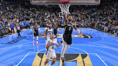 Damian Lillard of the Milwaukee Bucks scores the go ahead basket during the game against the Orlando Magic during the Emirates NBA Cup Quarterfinals at Fiserv Forum Center in Milwaukee, Wisconsin, on December 10, 2024.
