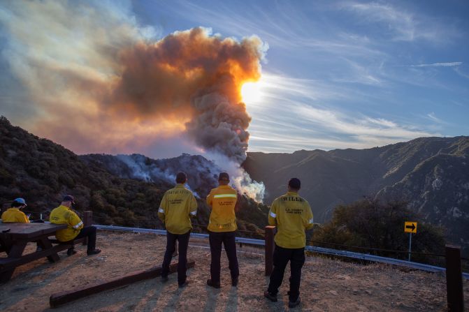 Firefighters monitor the Franklin Fire near Malibu on Tuesday, December 10.