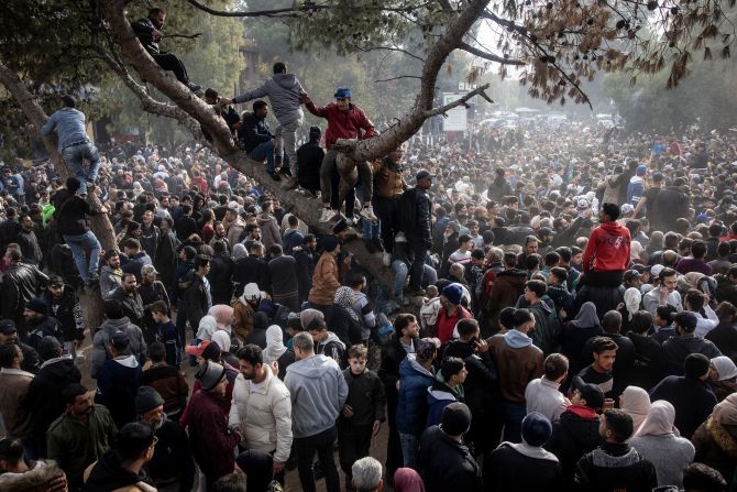 People gather in Al-Madan Square in Madaya, Syria, on December 11 to call for accountability of war crimes committed by the Syrian Armed Forces under the Assad regime.